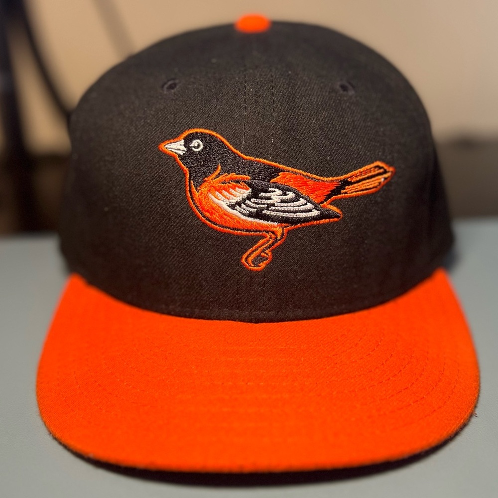 MLB Orioles New Era 5950 Size 7-7/8 Hat.
Pet Free/Smoke free home. No Flaws.